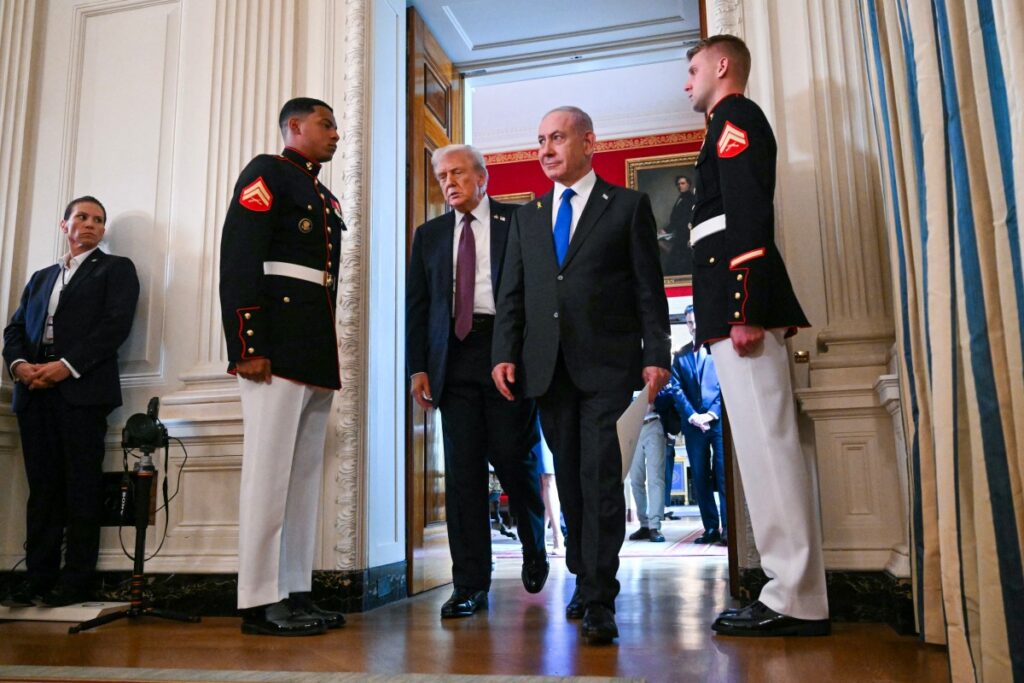 US President Donald Trump and Israeli Prime Minister Benjamin Netanyahu (R) leave the State Dining Room of the White House after a press conference in Washington, DC on September 29, 2025. US President Donald Trump said on Monday that Washington was “very close” to securing peace in the Gaza war, after meeting with Israeli Prime Minister Benjamin Netanyahu and releasing a 20-point peace plan. (Photo by Jim WATSON / AFP) 