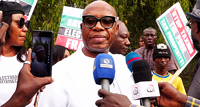 Amaechi, Son Join Protest Over E-Transmission Of Election Results, Says APC Is Afraid